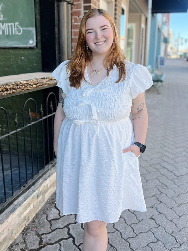 Curvy Textured Dress With Bow Detail