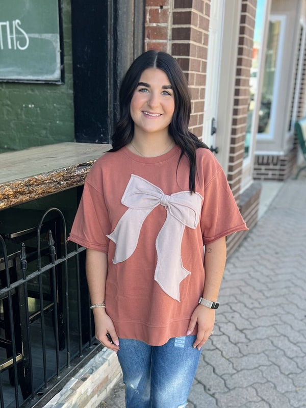 Rust Short Sleeve with Taupe Bow Applique Top