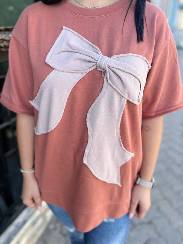 Rust Short Sleeve with Taupe Bow Applique Top