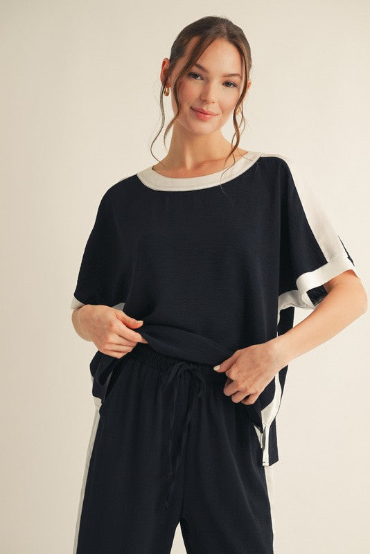 Black Short Sleeve Dressy Top With White Trim