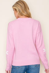 Pink Sweater with Dusty Pink Tinsel and White Snowflakes