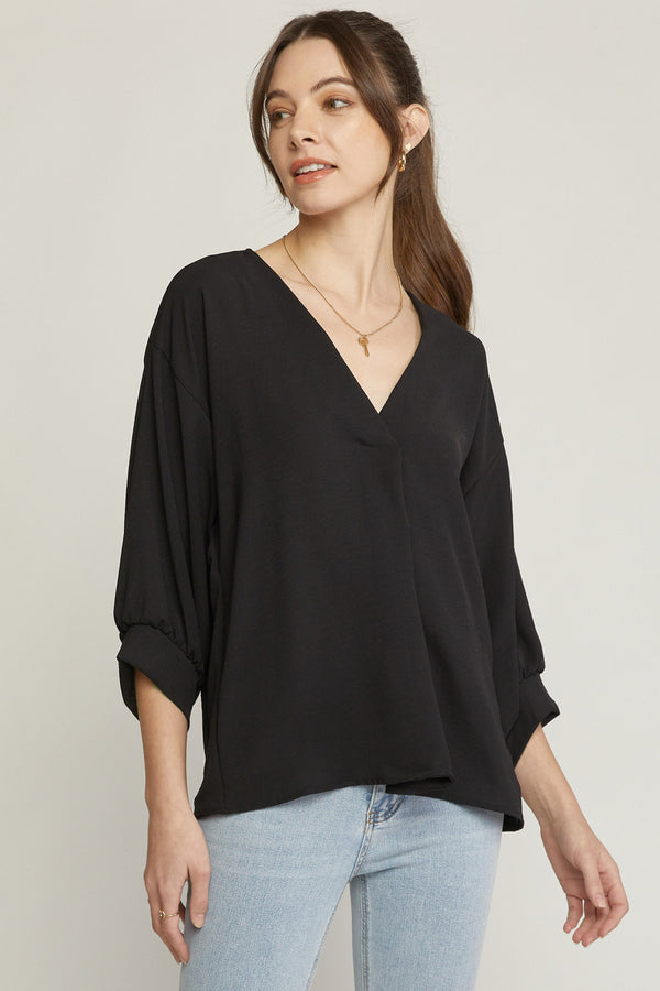 Solid three quarter puff sleeve top