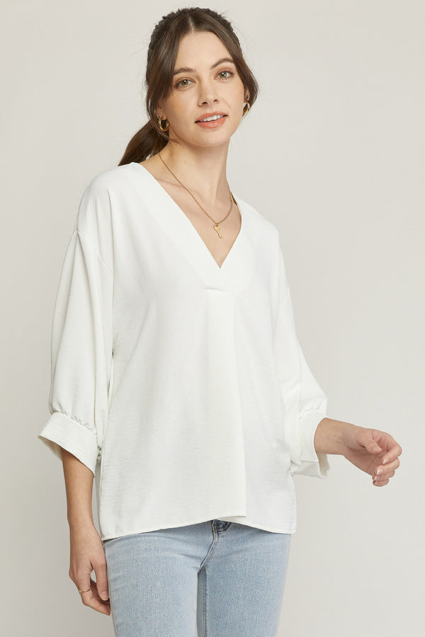 Solid three quarter puff sleeve top